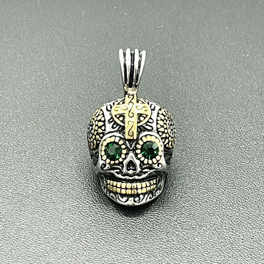 Pendentif Acier Inoxydable Tete De Mort Dorée Yeux Vert